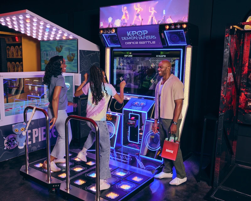 Guests in RePLAY playing the KPop Demon Hunters Dance game