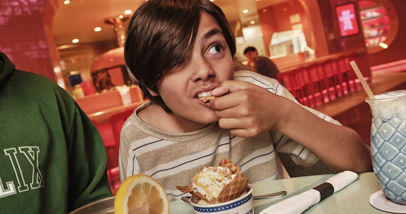 Boy eating in Netflx Bites
