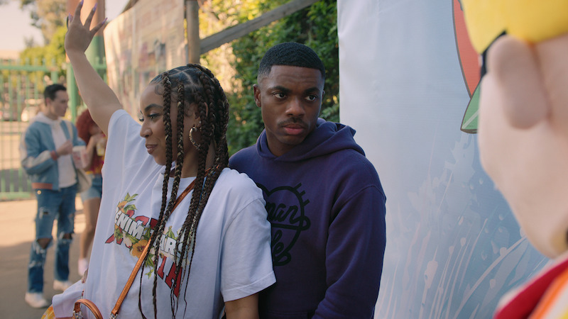 Andrea Ellsworth as Deja and Vince Staples as Vince Staples stand together outdoors in season 1 of 'The Vince Staples Show'