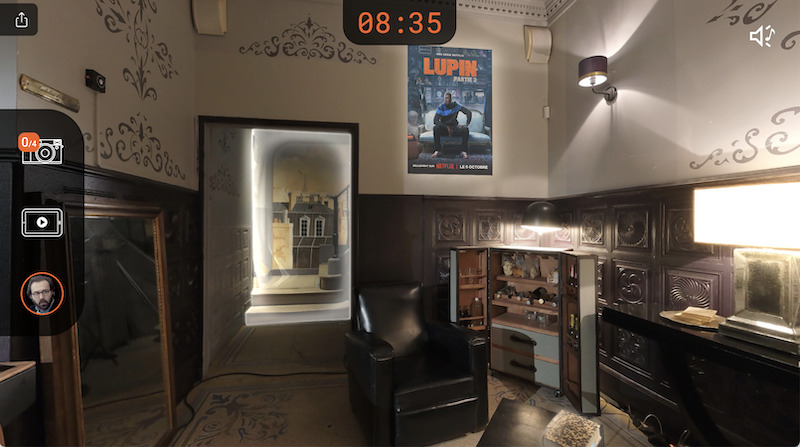Assane Diop's lair with a 'Lupin' poster in 'Lupin Experience' 