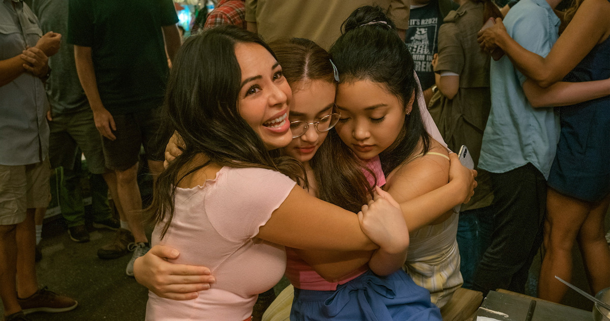 Janel Parris, Anna Cathcart and Lana Condor hug on the set of 'To All the Boys I've Loved Before: Always and Forever.'