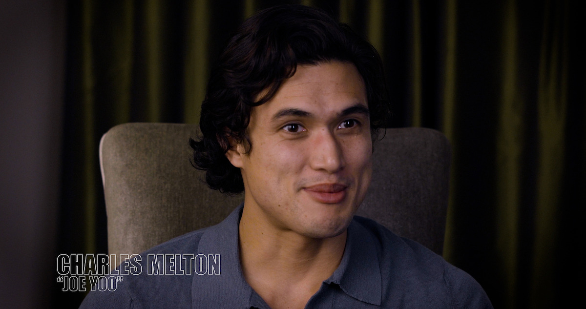 Charles Melton as "Joe Woo"