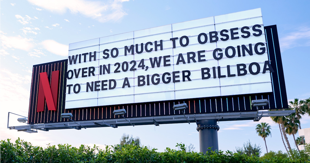 View of the SUnset Blvd Marquee for Next on Netflix - It features cut off text on both sides of the billboard, but you can read ‘With so much to obsess over in 2024, we are going to need a bigger billboard.’'