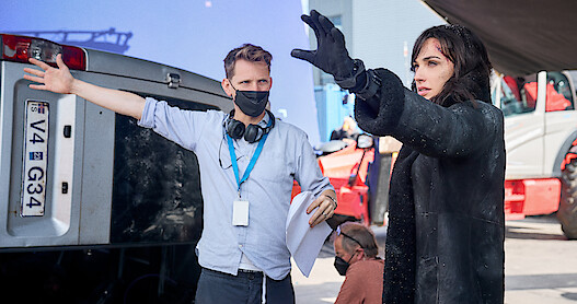 Director Tom Harper and Gal Gadot as Rachel Stone on the set of 'Heart Of Stone'.
