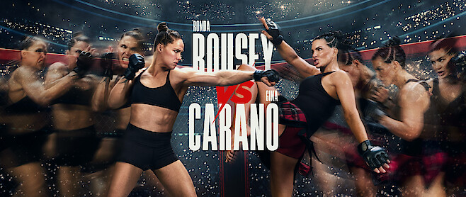 Two female MMA fighters face off in a dynamic action scene inside a stadium cage, with dramatic lighting and motion blur effects. A crowd and bright lights fill the background, text shows "Rousey vs Carano" in bold letters at the center.