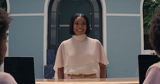 Gabrielle Union wears a pink cape top in 'The Perfect Find.'