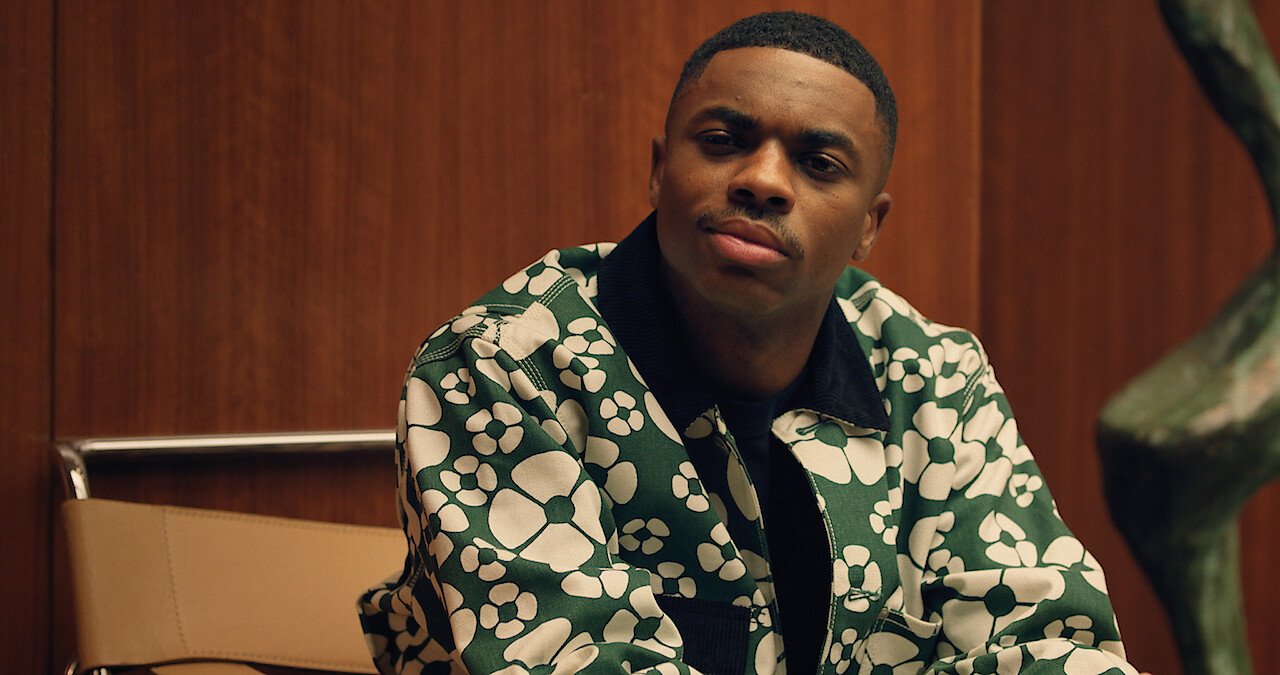 Vince Staples as Vince Staples wears a green jacket with white flowers in season 1 of 'The Vince Staples Show'