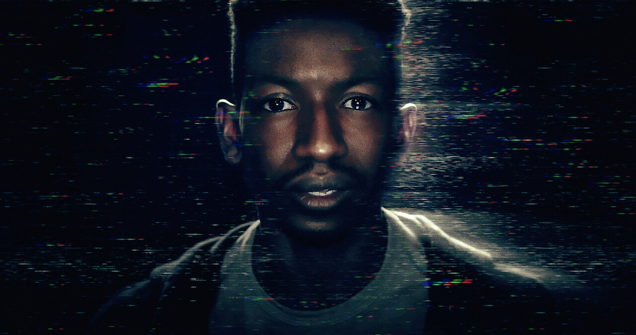 An image of Mamoudou Athie playing Dan Turner in Archive 81